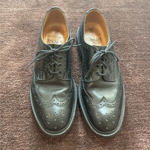 Tricker's Black Leather Wingtip Brogues